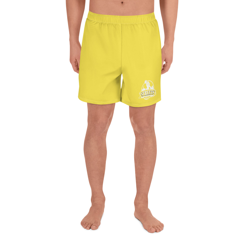 grey shorts yellow shirt