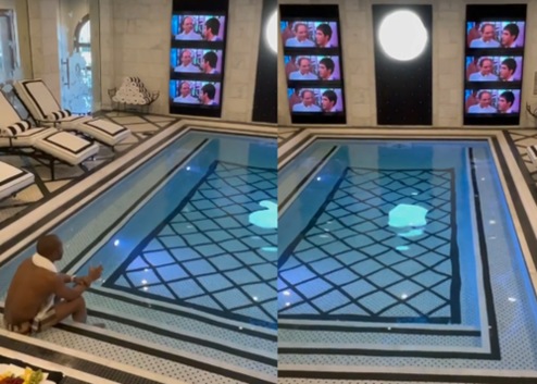 Floyd Mayweather Comfortably Watching Scarface In His Indoor Pool