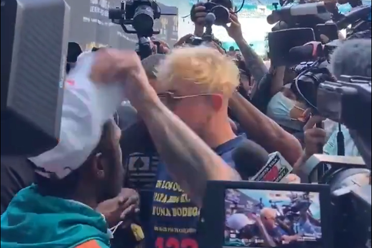 Jake Paul Disrespects Floyd Mayweather By Snatching His Hat Off His Head